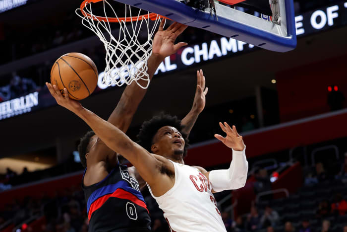 Mar 1, 2024; Detroit, Michigan, USA; Cleveland Cavaliers forward Isaac Okoro (35) shoots on Detroit Pistons center Jalen Duren (0) in the first half at Little Caesars Arena.